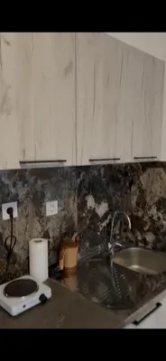 a kitchen counter top with a sink and a sink at Lupo in Budva