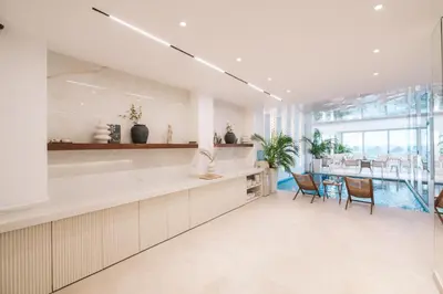 a kitchen with a pool and a dining room at Hotel Senator Lux in Ulcinj