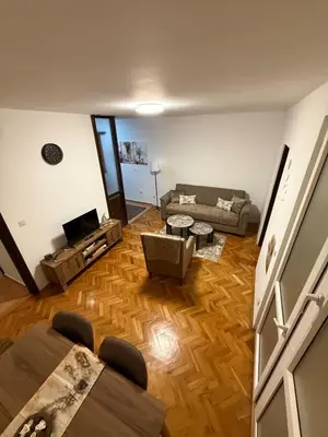a living room with a couch and a table at Sunčana oaza, Sutomore in Sutomore