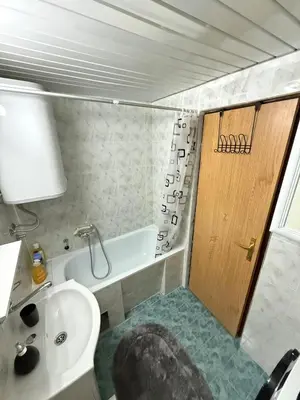 a bathroom with a sink and a toilet and a tub at Sunčana oaza, Sutomore in Sutomore