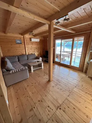 a large living room with a couch and a table at Ada Bojana River House 1 in Ulcinj