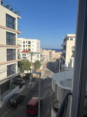 a view of a city street with cars and buildings at Montebay Studio in Dobra Voda