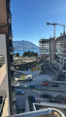 a view of a parking lot in a city at Modern Apartment Near the Beach - Budva in Budva