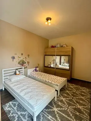a bedroom with a large bed in a room at Maximus in Seoca