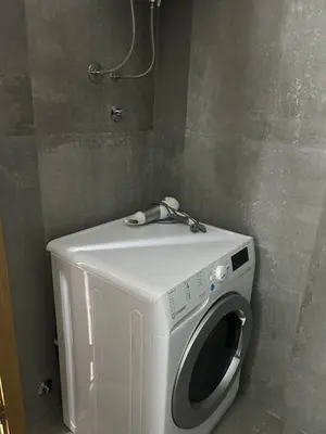 a washer and dryer in a bathroom at Apartment Cactus in Ulcinj