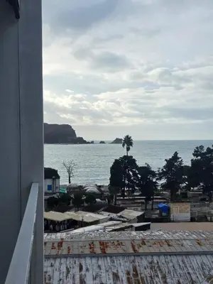 a view of the ocean from a building at Orenda Residences- Sea View Apartment in Budva