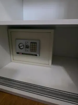 a microwave oven sitting on top of a shelf at Orenda Residences- Sea View Apartment in Budva