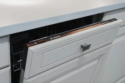 a close up of a microwave drawer in a kitchen at Green Garden Villa in Becici