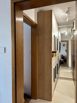 a hallway with a door leading into a room at LuxeStay Ksenija apartment in Podgorica