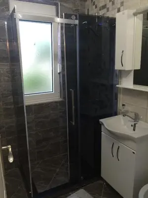 a bathroom with a shower and a sink at Apartments Amira in Ulcinj