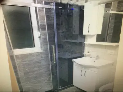 a bathroom with a shower and a sink at Apartments Amira in Ulcinj