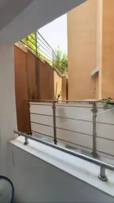 a room with a shelf with a window at ALEKS apartman in Rafailovici
