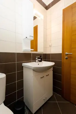 a bathroom with a sink and a mirror at Apartment sea view Asija in Bar