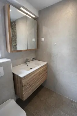 a bathroom with a sink and a mirror at Blue Vista in Petrovac na Moru