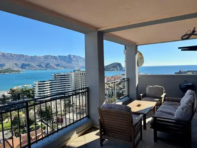 a balcony with a view of the ocean and mountains at Panoramic Sea View - Two Bedroom Apartment - Budva Center in Budva