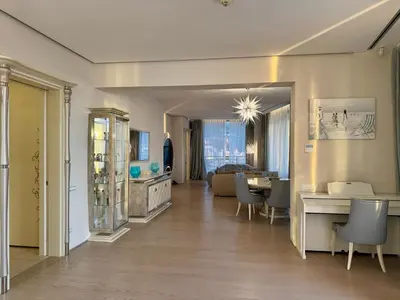 a living room with a table and chairs and a living room at Exclusive Luxury Villa in Dukley Gardens in Budva