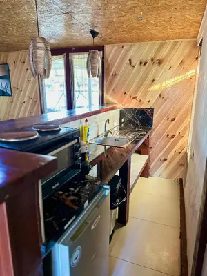 a kitchen with a stove and a stove top oven at Amazonas Pirates 3 in Ulcinj