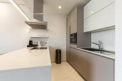 a kitchen with white counters and stainless steel appliances at Luxury Dukley Villa in Boreti