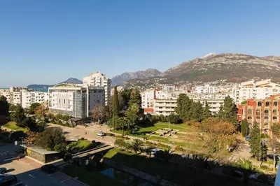 a view of a city with buildings and a park at Tramonto City Center Apt with Sea View and Garage in Bar