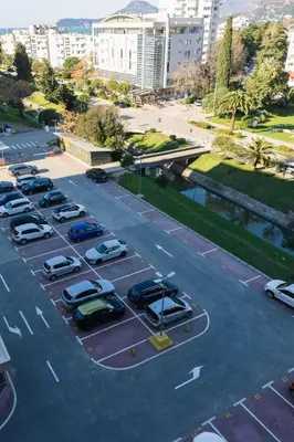 an aerial view of a parking lot with cars parked at Tramonto City Center Apt with Sea View and Garage in Bar