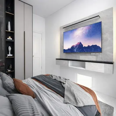 a living room with a television on a wall at Hotel & SPA Ricardo Residence in Ulcinj