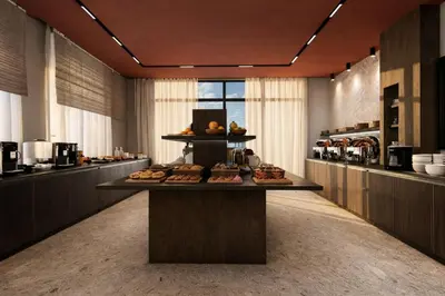 a room with a buffet of food on a table at Hotel & SPA Ricardo Residence in Ulcinj