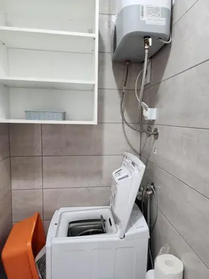 a small bathroom with a toilet with apaper at Broj 4 in Podgorica