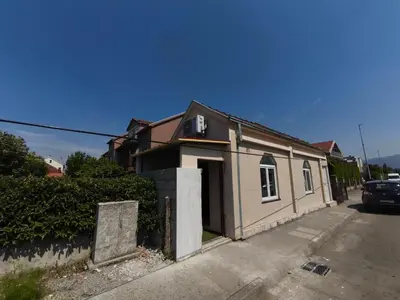a small house sitting on the side of a street at Studio19 in Podgorica