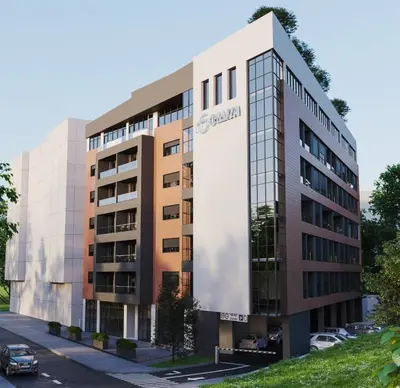 a building with a sign on the side of it at Skyline Residence Podgorica in Podgorica