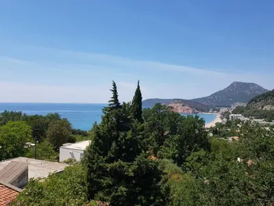 a view of the ocean from a house at Guest House Dragomir in Sutomore