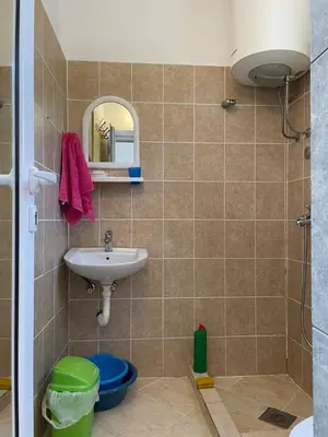 a bathroom with a sink and a toilet at Apartment Mira in Sutomore