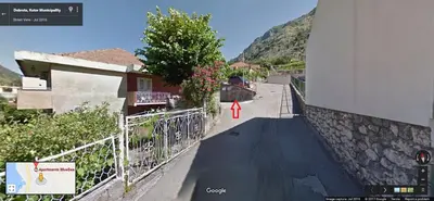 a rendering of a road with a red arrow on it at Apartments Blue Sea in Kotor