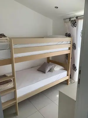 a couple of bunk beds in a room at Apartments Ljiljana in Bar