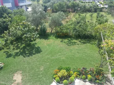 an aerial view of a garden with flowers and trees at House Kraja in Ulcinj