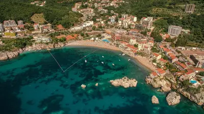 an aerial view of a beach with a resort at Apartments My Przno in Sveti Stefan