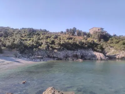 a view of a river with a house on a hill at Villa Persik in Utjeha