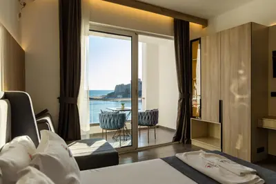 a hotel room with a view of the ocean at Continental Hotel in Ulcinj