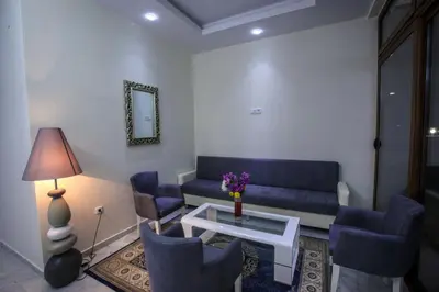 a living room with a couch and chairs and a table at Spa Hotel Montefila in Ulcinj