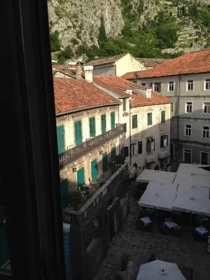 a view from a window of a city with buildings at Apartment Miguel in Kotor