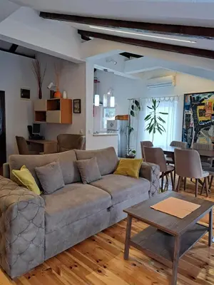 a living room with a couch and a table at Apartment Sasha in Kotor