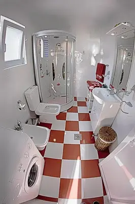a bathroom with a red and white checkered floor at Villa Blue Dreams in Bar