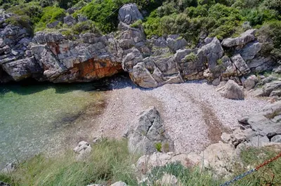 a rocky shoreline with rocks and the water at Villa Blue Dreams in Bar
