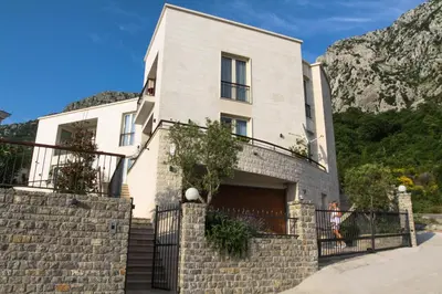 a house on the side of a mountain at Villa Hedonism in Sveti Stefan