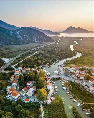 an aerial view of a town next to a river at Apartments Olga in Virpazar