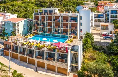 an aerial view of a hotel with a swimming pool at Arabela 2 Apartments in Utjeha