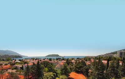 a view of a town with the water in the background at Apartment Obradovic in Budva