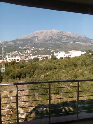 a view of a mountain from a train window at Apartment Sea Space in Dobra Voda