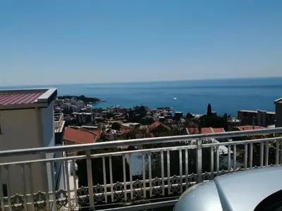 a view of the ocean from a balcony at Apartment Light House in Dobra Voda
