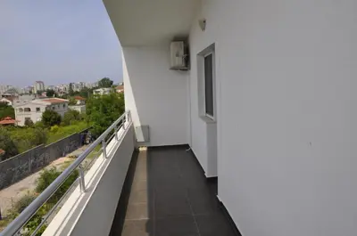 a balcony with a view of a city at Guest House Lalic in Bar