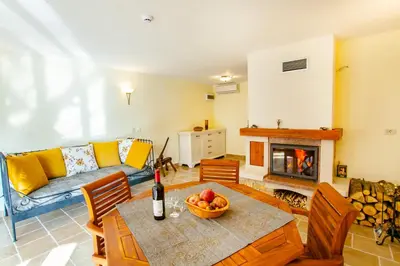 a living room with a table and a couch at 